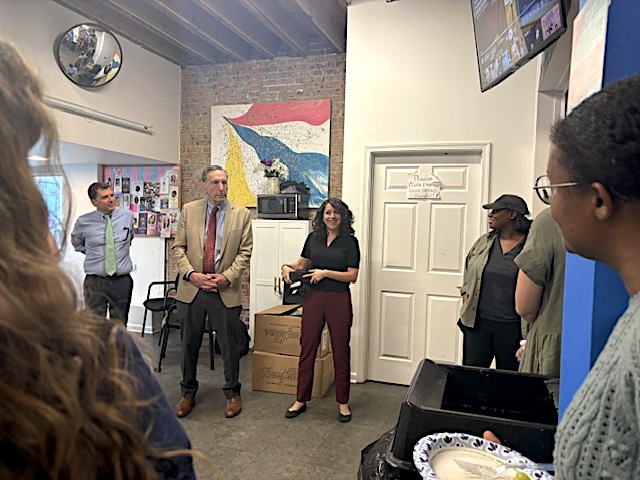 Andrea Lisco, MD, PhD, and Henry Masur, MD of the National Institutes of Health (NIH) address group with Elana Rosenthal, MD, Co-Director, the Research Initiative on Infectious Disease and Substance Use (RIIS)